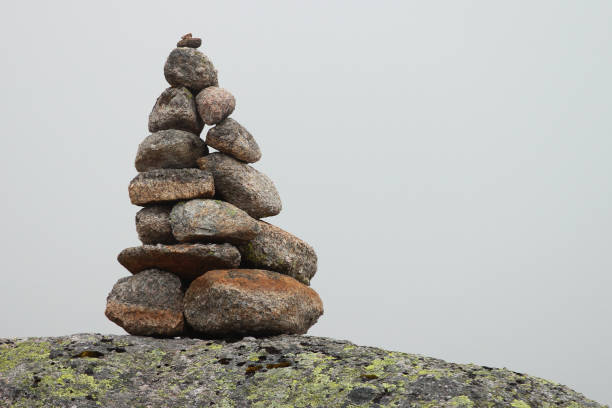 istock Stone cairn on a way to Kjerag mountain, Norway 1332472868