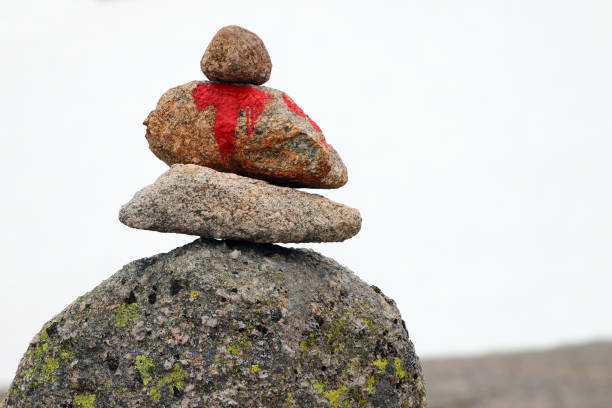istock Stone cairn on a way to Kjerag mountain, Norway 1332472893