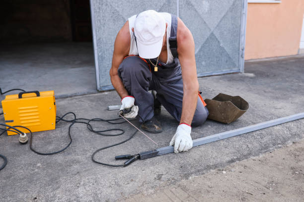 istock Metal worker repairing a pipe with welding torch 1332474106