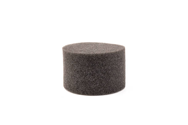 istock piece of foam rubber on white background. Black sponge 1332474157