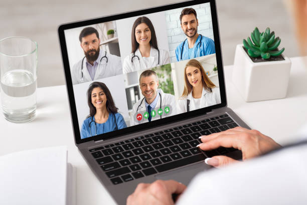 istock Unrecognizable Female Doctor Using Laptop Computer Communicating With Colleagues Online 1332475750