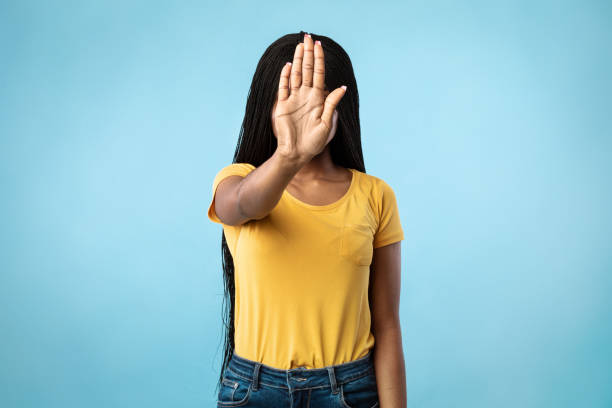 istock Unrecognizable African American Lady Gesturing Stop Over Blue Background 1332476808