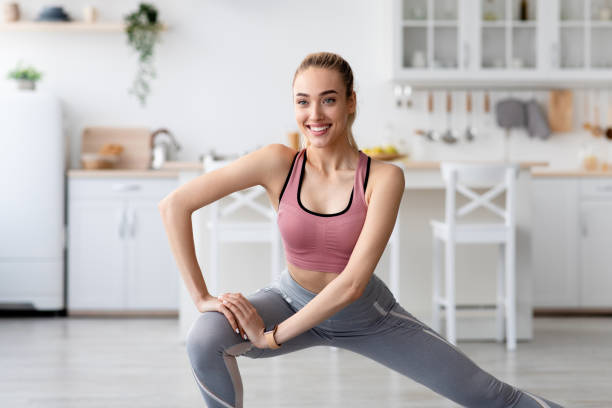istock Active workout at home, weight loss and muscle exercises, modern workout, covid-19 quarantine 1332476916