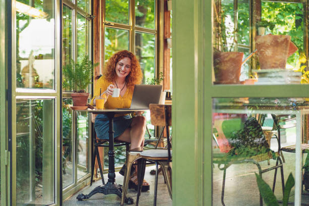 istock Charming female entrepreneur having web conference with client, talking about all topics, so she can help about branding 1332479716