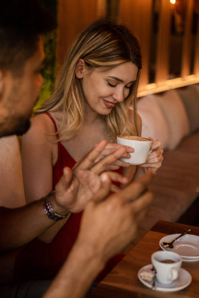 istock Dating in Coffee Shop 1332479745