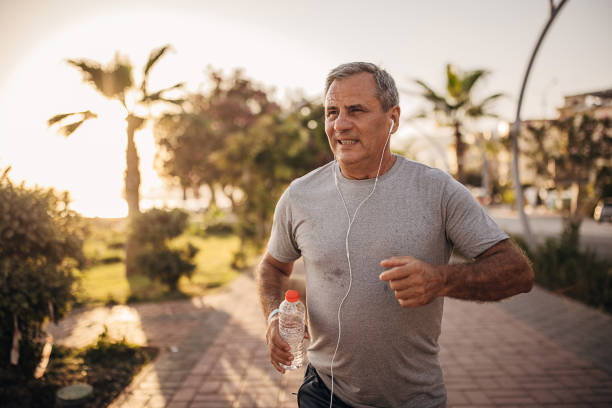 istock Senior man running on the sidewalk 1332482739