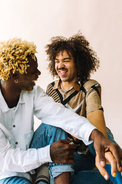 istock Sweet gay couple sharing a romantic moment in a studio 1332485242