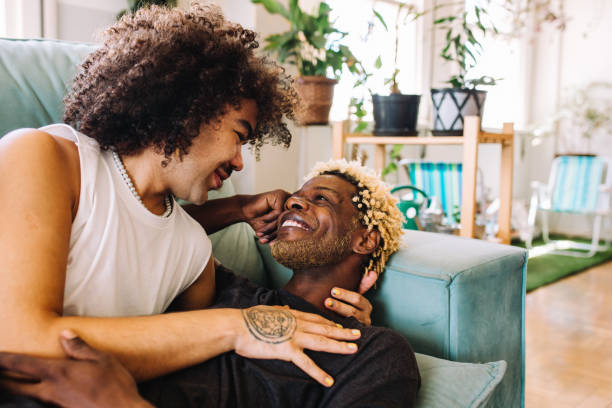 istock Affectionate gay couple bonding at home 1332485495
