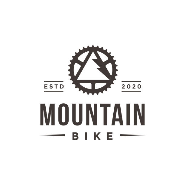 Minimalist seal emblem mountain bike vector, with bicycle crank and mountain vector icon on white background Minimalist seal emblem mountain bike vector, with bicycle crank and mountain vector icon on white background chainring stock illustrations