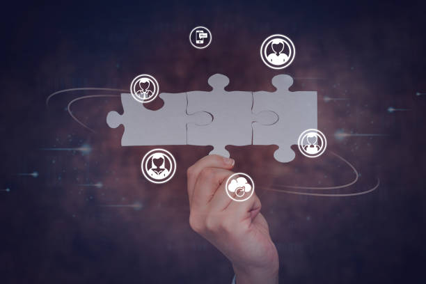 istock Hand Holding Jigsaw Puzzle Piece Unlocking New Futuristic Technologies. Palm Carrying Puzzles Part Displaying Solving Late Innovative Virtual Ideas. 1332489975