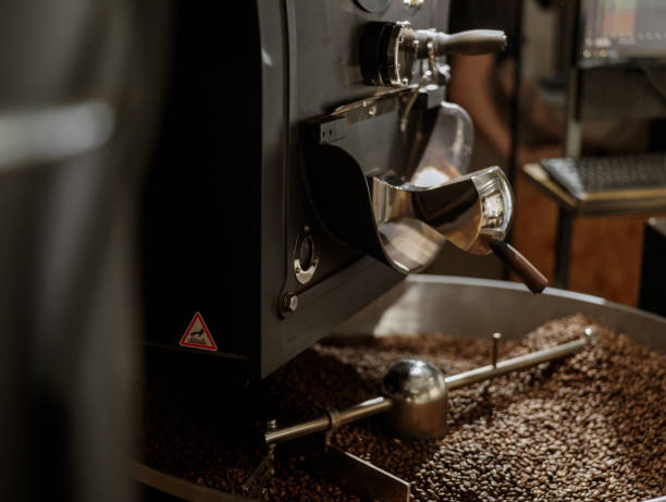 istock Coffee roasting machine with coffee beans in cooling tray 1332497667