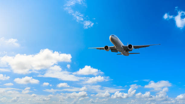 Aerial flying airplane and sky landscape close-up Aerial flying airplane and sky landscape close-up in China wow airlines stock pictures, royalty-free photos & images