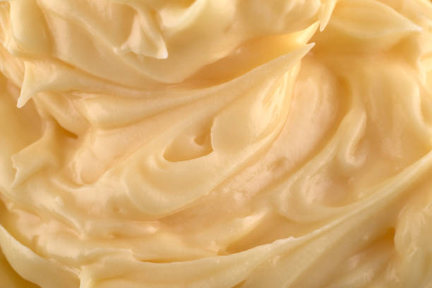 Yellow texture of cream background, copy space. Top view, flat lay