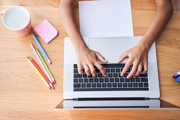 istock Girl typing at the laptop 1332511892