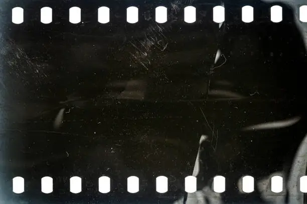 Photo of Dusty and grungy 35mm film texture or surface