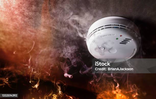 Smoke Detector And Fire Alarm In Action Background Stock Photo - Download Image Now - Fire - Natural Phenomenon, Smoke Detector, Safety