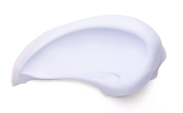 istock shaving foam isolated on white background close up 1332515203