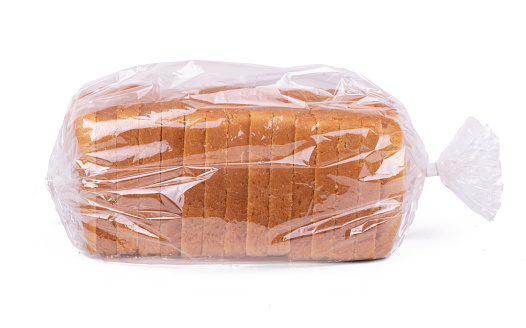 Sliced white bread in plastic bag isolated on white background
