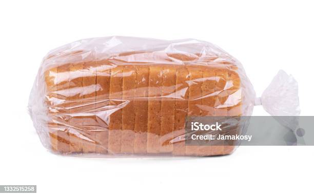 Sliced White Bread In Plastic Bag Isolated On White Background Stock Photo - Download Image Now