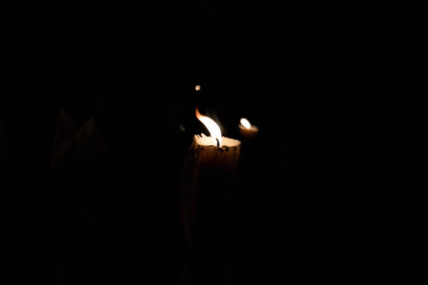 Candles glowing at night background