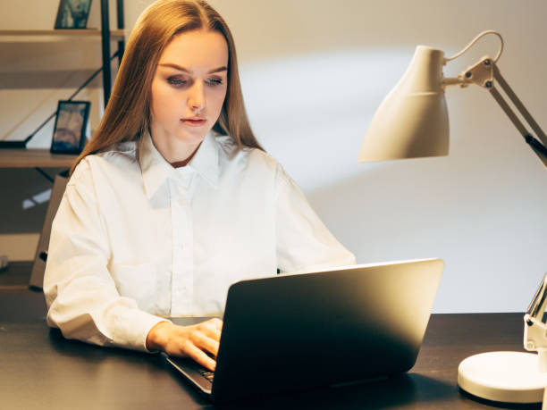 istock work from home lockdown woman typing laptop 1332516876
