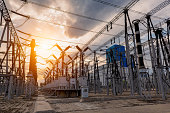 High voltage substation under sunset