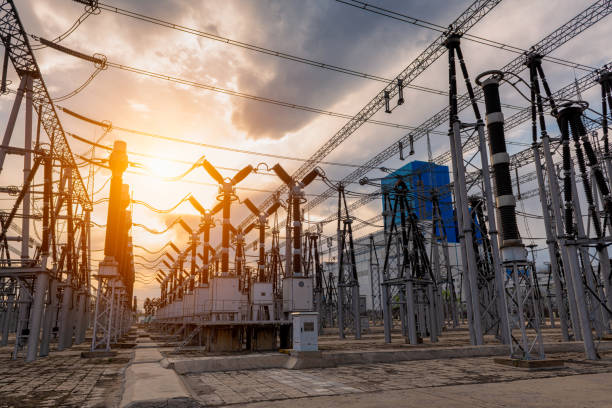 High voltage substation under sunset High voltage substation under sunset high voltage sign stock pictures, royalty-free photos & images
