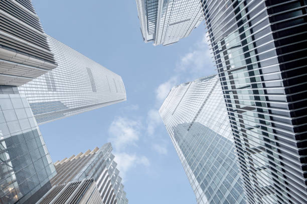 istock Skyscrapers under blue sky and white clouds in downtown district 1332519039