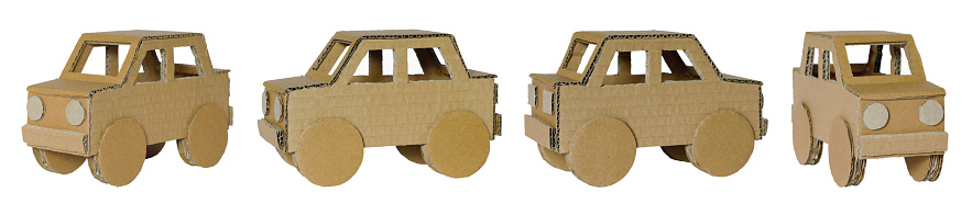 One car model is shown from four different sides. This cardboard car is isolated on a white background.