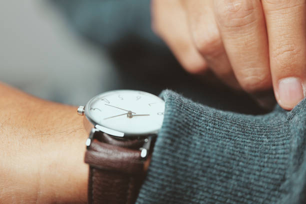 istock Man checking time he watch - Close-up 1332521915