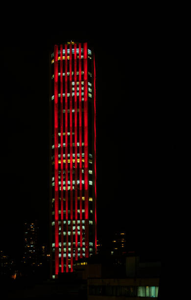 The Torre Colpatria ( ColpatriaTower) in Bogota is a landmark building due to its night lighting in red, white and blue using Xenon strobe lights. As a bonus you get  a church against the night sky a a few free stars thrown in gratis