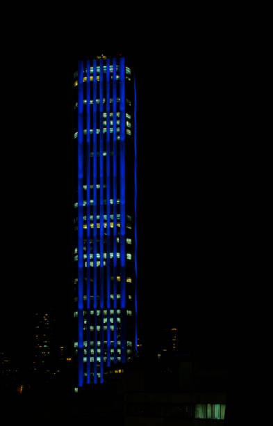 The Torre Colpatria ( ColpatriaTower) in Bogota is a landmark building due to its night lighting in red, white and blue using Xenon strobe lights. As a bonus you get  a church against the night sky a a few free stars thrown in gratis