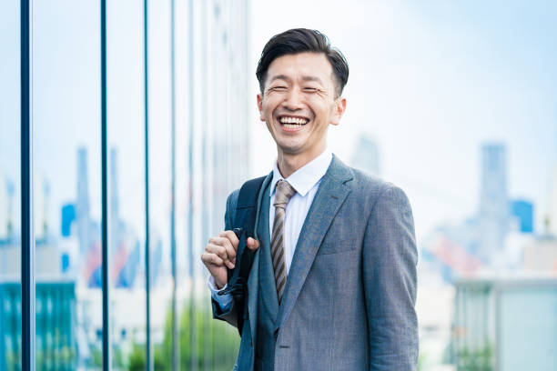 istock A businessman who commute with a smile 1332530009