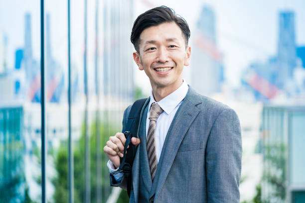 istock A businessman who commute with a smile 1332530612