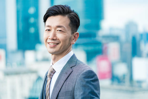 istock A businessman standing in the office district with a smile 1332531091