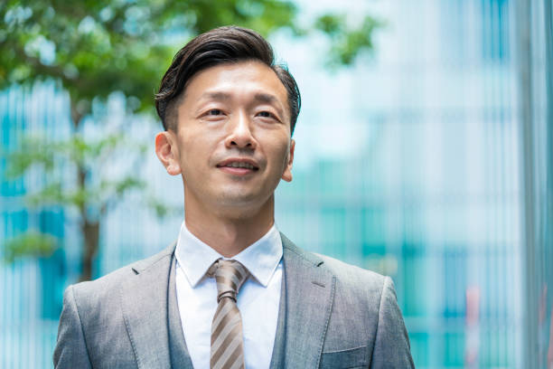 istock A businessman standing in the office district with a smile 1332531292