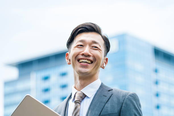 istock A businessman standing in the office district with a smile 1332531831