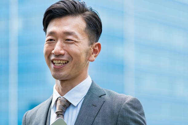 istock A businessman standing in the office district with a smile 1332531867