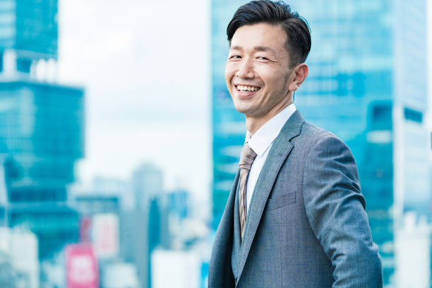 istock A businessman standing in the office district with a smile 1332531950