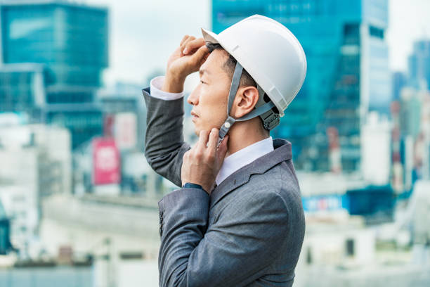 istock A businessman wearing a helmet 1332532275