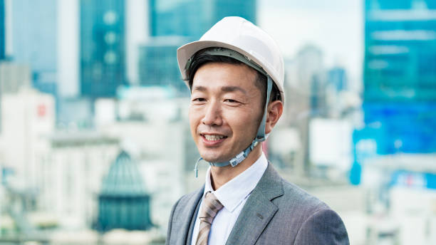 istock A businessman wearing a helmet 1332532345