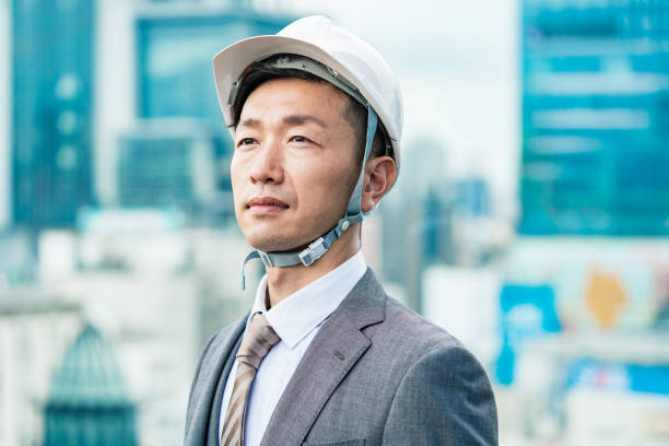 istock A businessman wearing a helmet 1332532384