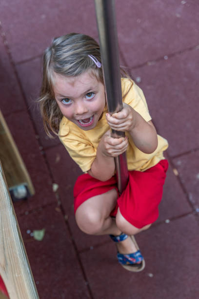istock cute little girl have fun 1332532406