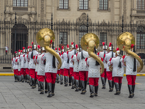 Lima, Peru - December 12, 2019: Guards of the Presidential Palace are giving a concert on the Plaza de Armas before changing of the guards ceremony. South America.