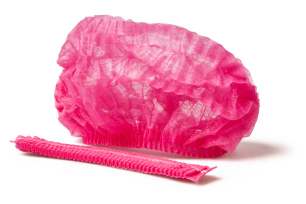 istock Red medical surgical non woven disposable cap isolated 1332535341