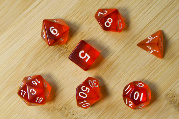 istock Set of dice for fantasy dnd and rpg tabletop games Board game polyhedral dices with different sides on wooden background 1332536475