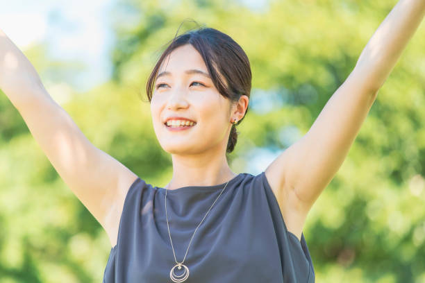 istock Young woman relaxing in the green 1332539341