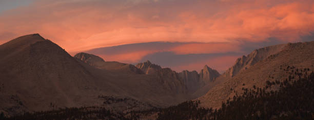 istock Sunset with dramatic clouds over Mount Whitney on the Pacific Crest Trail seen from Crabtree Meadows along the PCT California Section G from Walker Pass in the USA. 1332540526