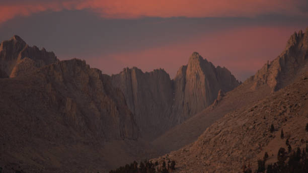 istock Sunset with dramatic clouds over Mount Whitney on the Pacific Crest Trail seen from Crabtree Meadows along the PCT California Section G from Walker Pass in the USA. 1332540544