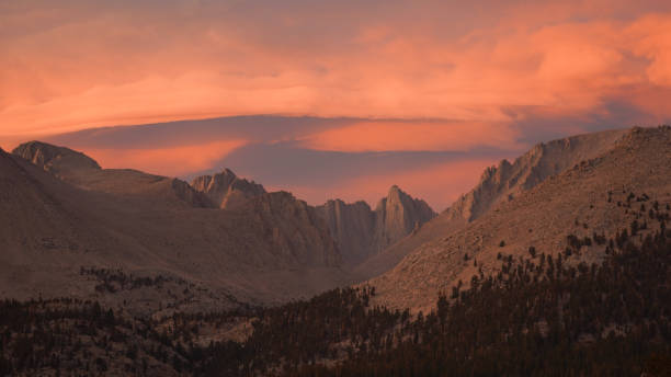 istock Sunset with dramatic clouds over Mount Whitney on the Pacific Crest Trail seen from Crabtree Meadows along the PCT California Section G from Walker Pass in the USA. 1332540555
